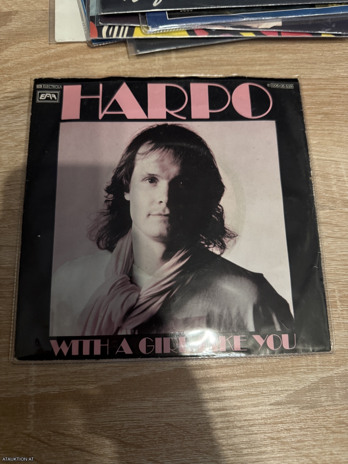 SINGLE / Harpo – With A Girl Like You