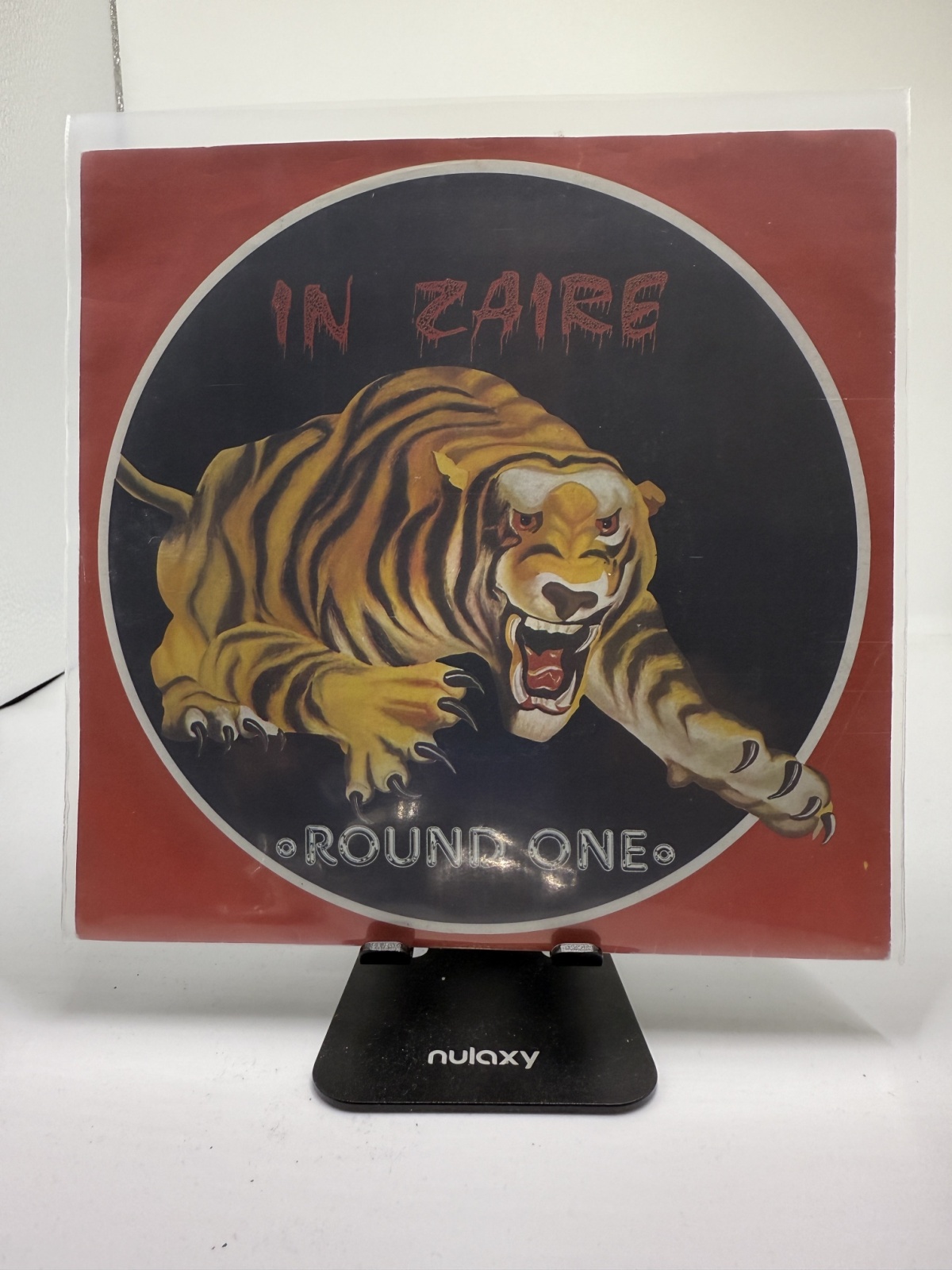 Single / Round One – In Zaire