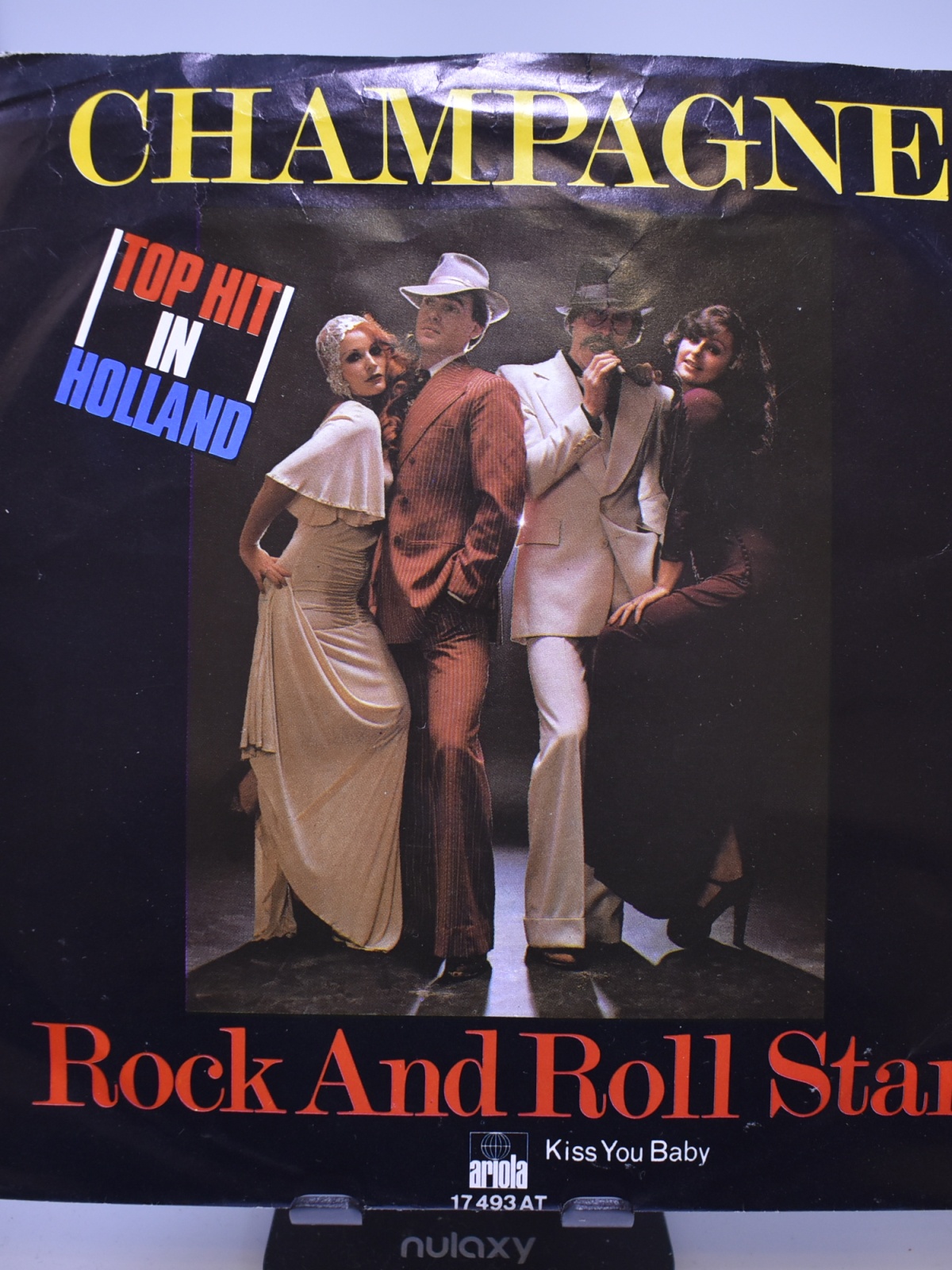 Single / Champagne – Rock And Roll Star