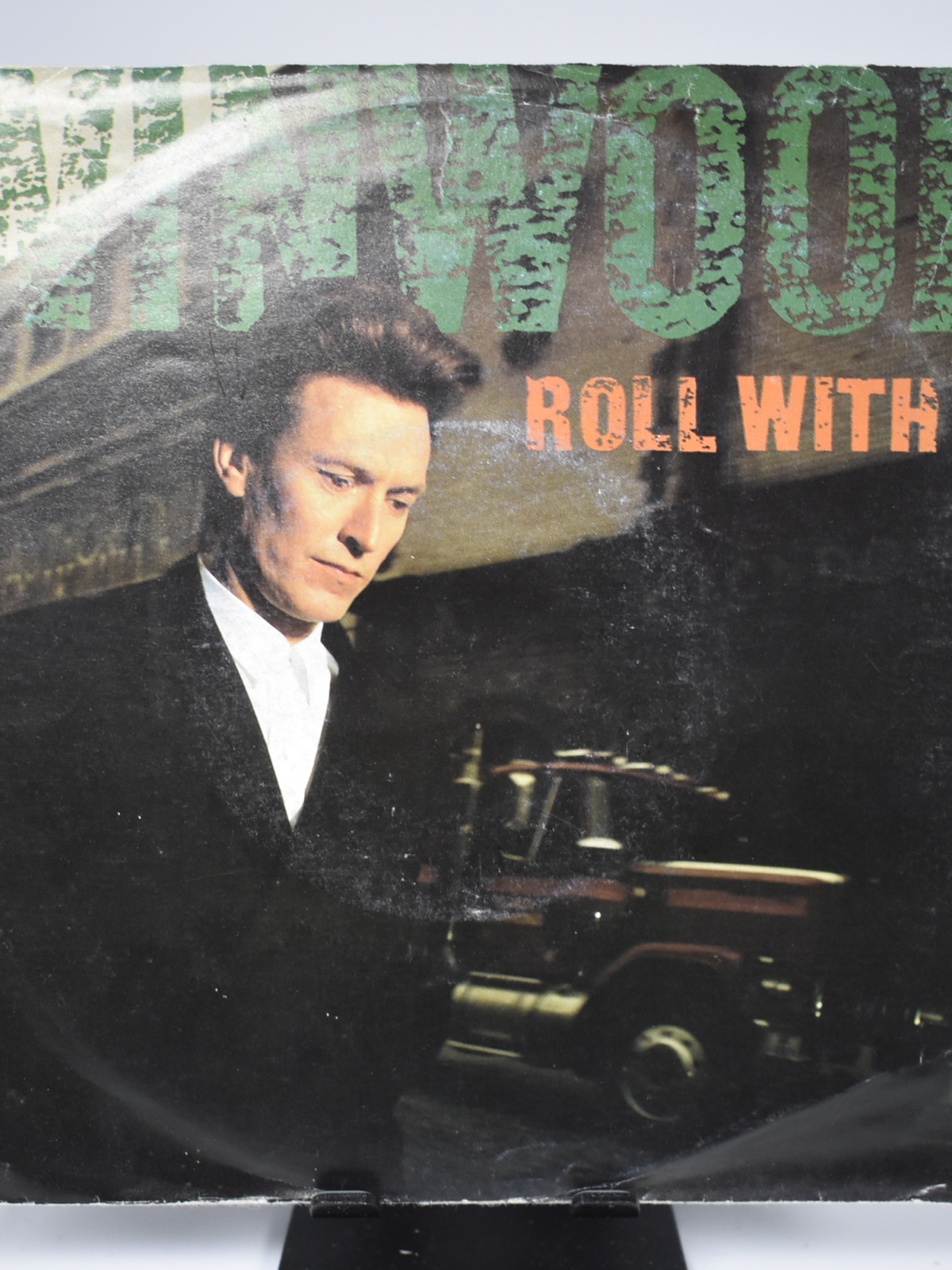 Single / Steve Winwood – Roll With It